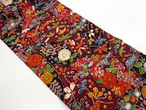 笹に草花・幾何学模様名古屋帯